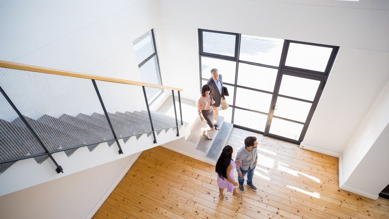 people looking at new home real estate realtor