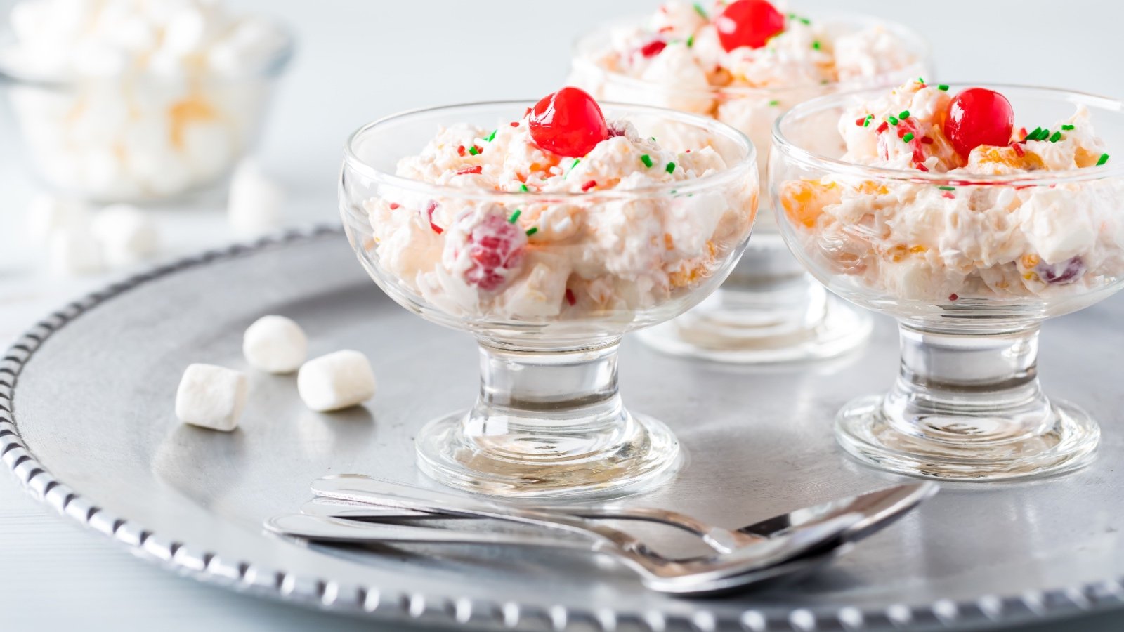 Ambrosia Salad dessert with marshmallow cherry and sprinkles Carey Jaman Shutterstock