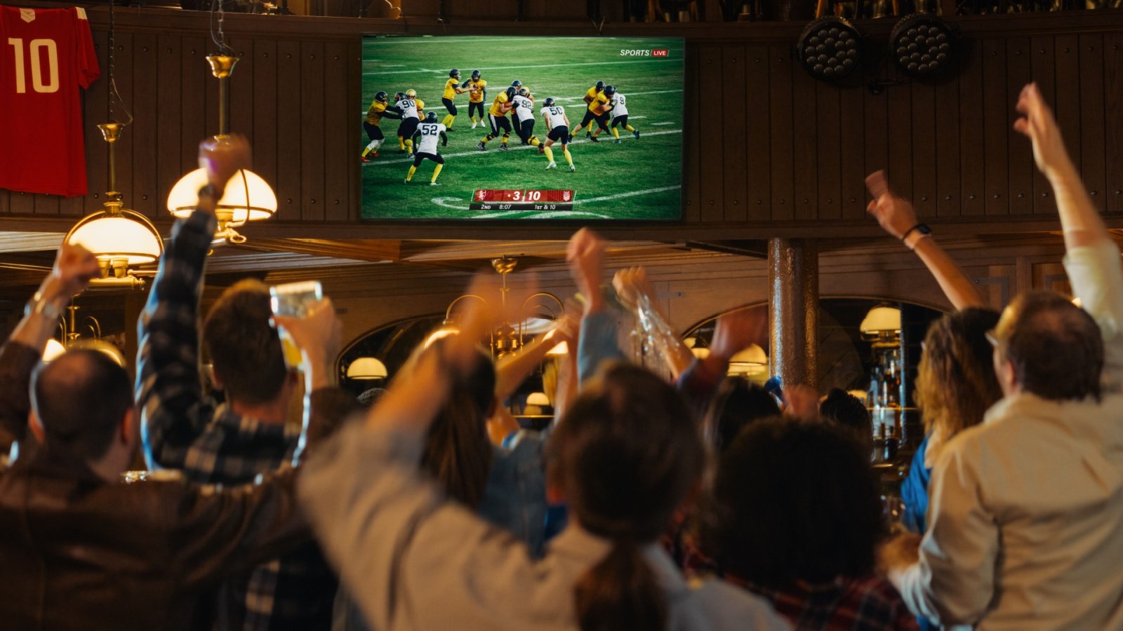 American Football Fans Watch Sports Gorodenkoff Shutterstock