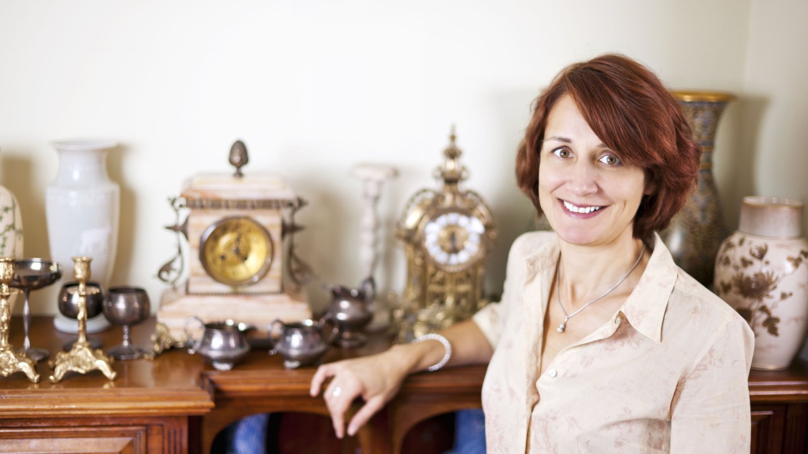 Antiques clocks thrift candlesticks vases Elena Elisseeva Shutterstock