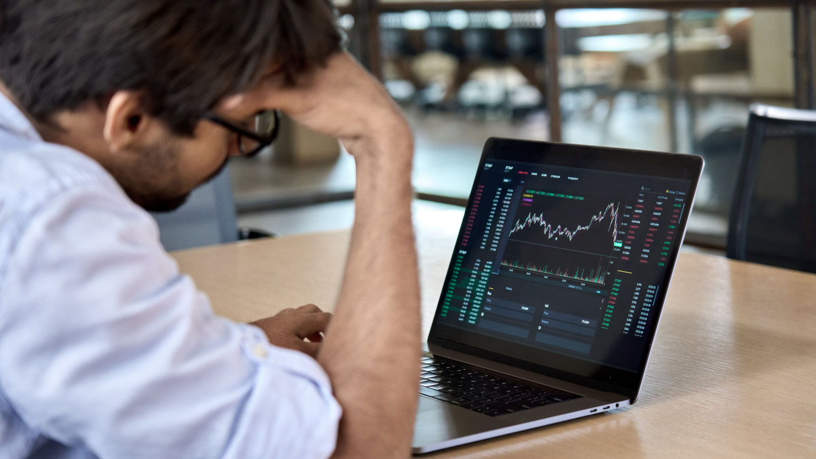 Anxious male investor trader stocks market finance business Ground Picture Shutterstock