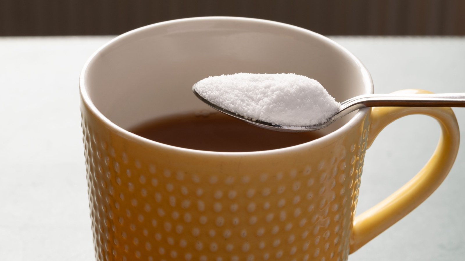 Aspartamine sweetener food on tea spoon John B Hewitt Shutterstock