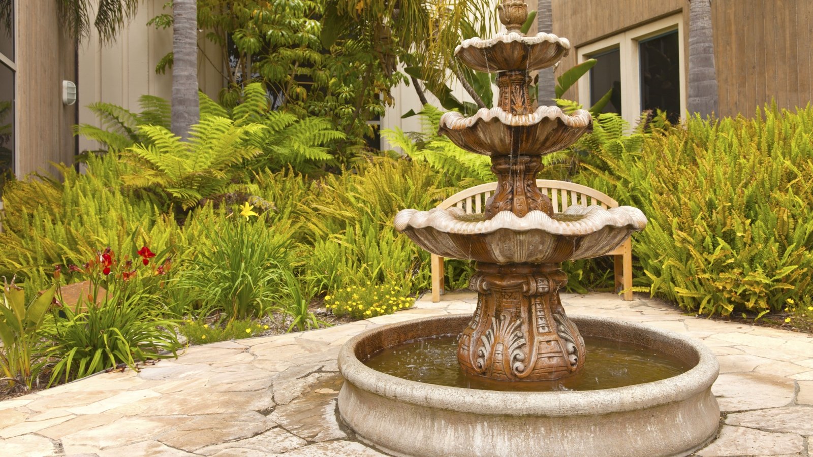 Backyard fountain landscape Rigucci Shutterstock