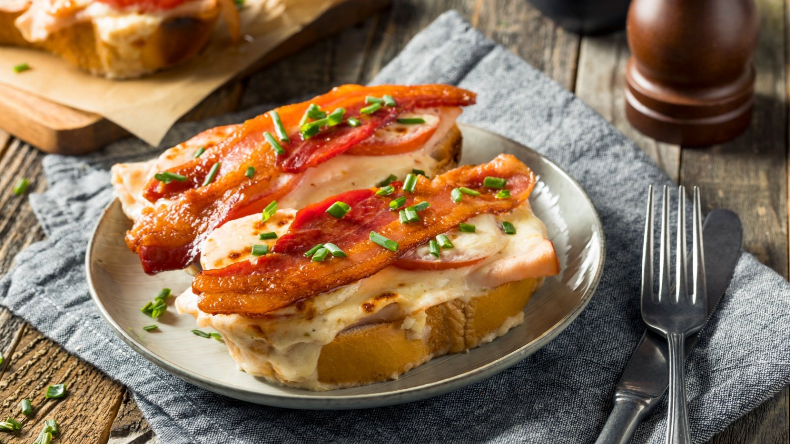 Baked Kentucky Hot Brown with Bacon Chicken Turkey and Mornay Cream Sauce Brent Hofacker Shutterstock Baked Kentucky Hot Brown with Bacon Chicken Turkey and Mornay Cream Sauce Brent Hofacker Shutterstock