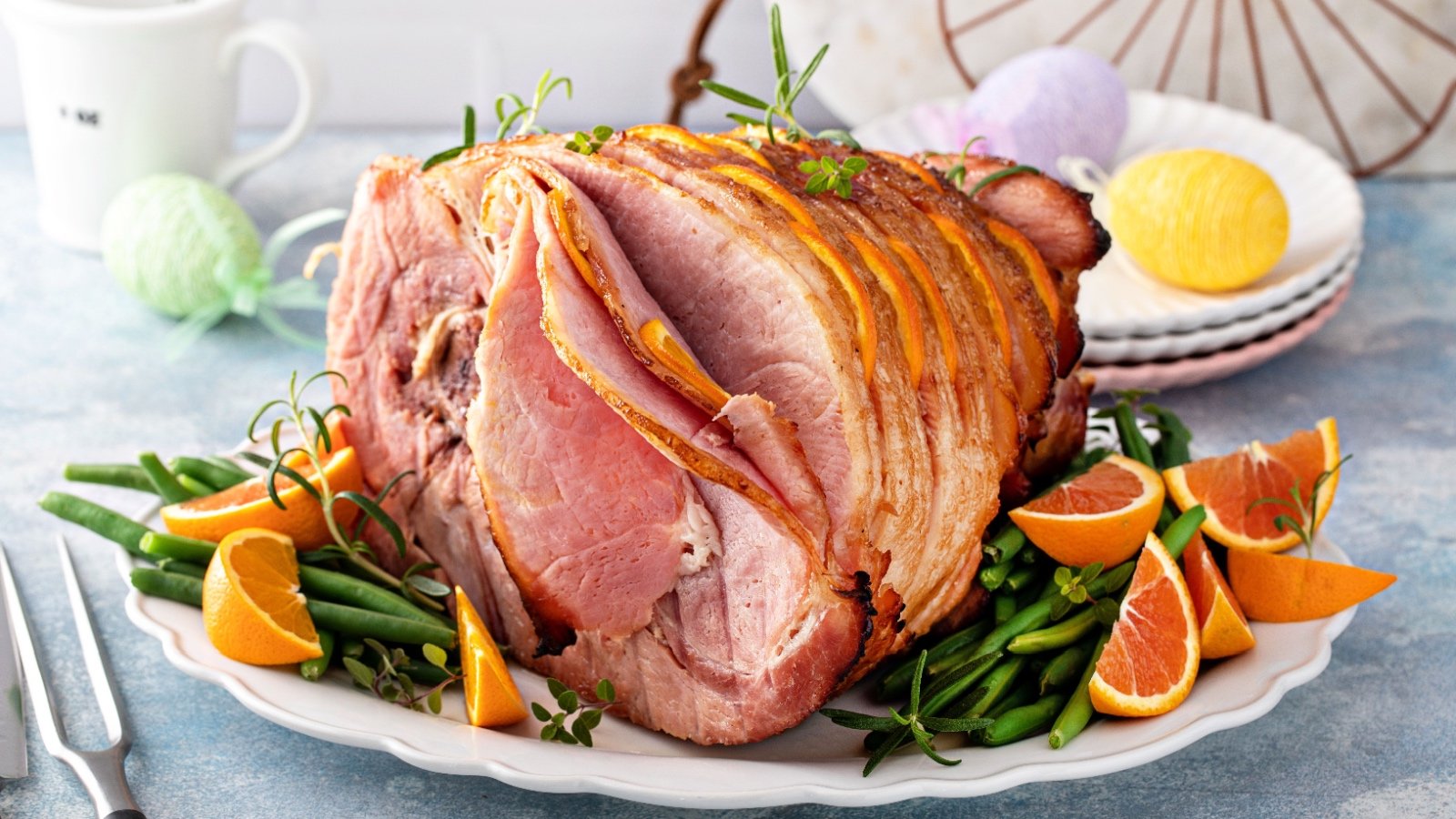 Baked ham dinner for Easter with green beans Elena Veselova Shutterstock