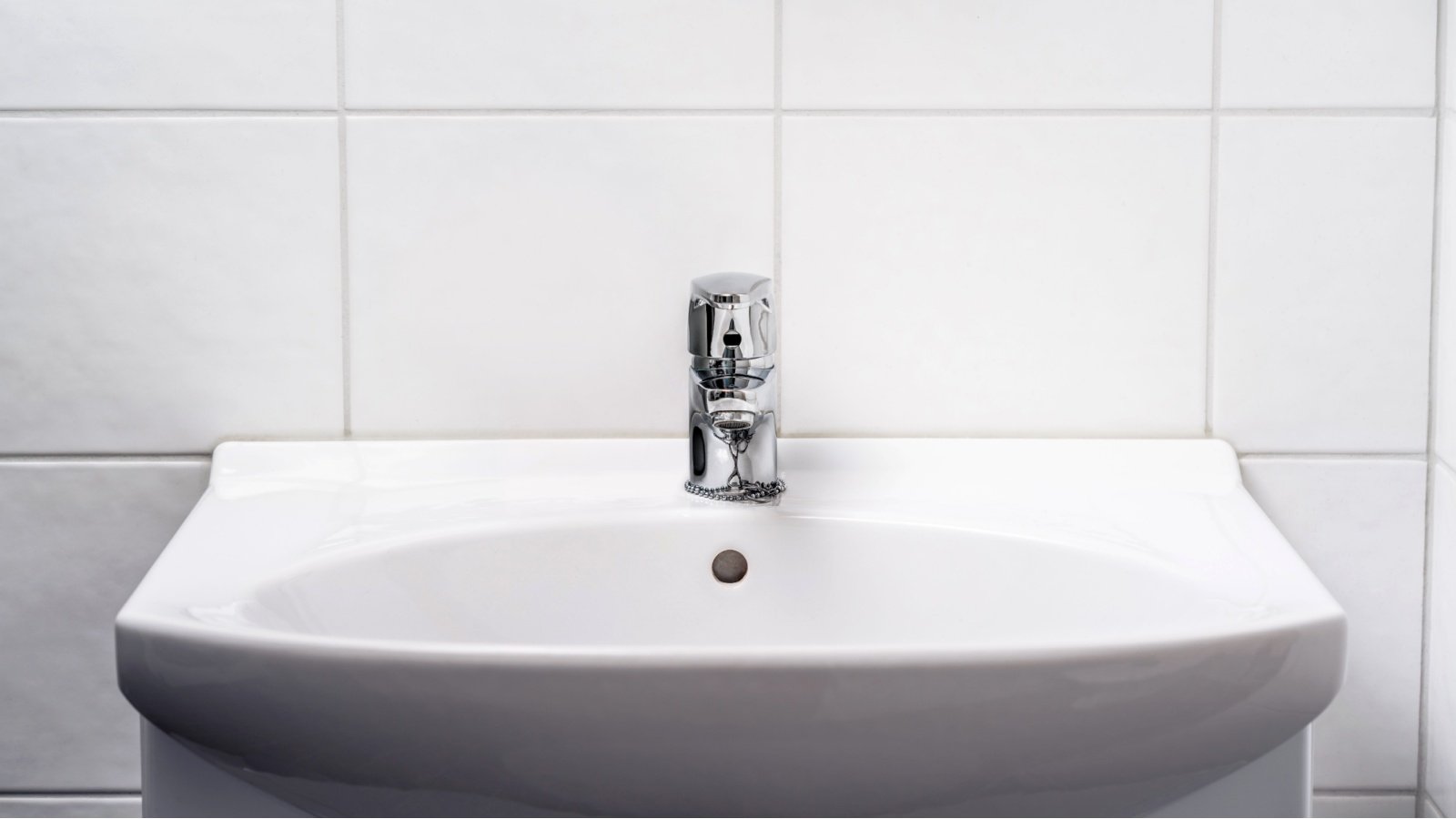 Bathroom sink public restroom washing hands Tero Vesalainen Shutterstock