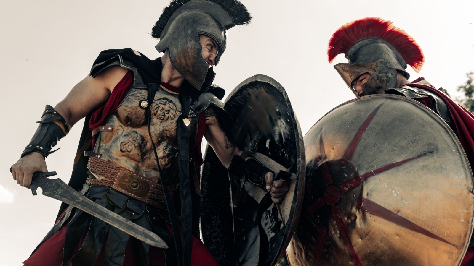 Battle with swords between two ancient greek or roman warriors in battle sparta Stasia04 Shutterstock