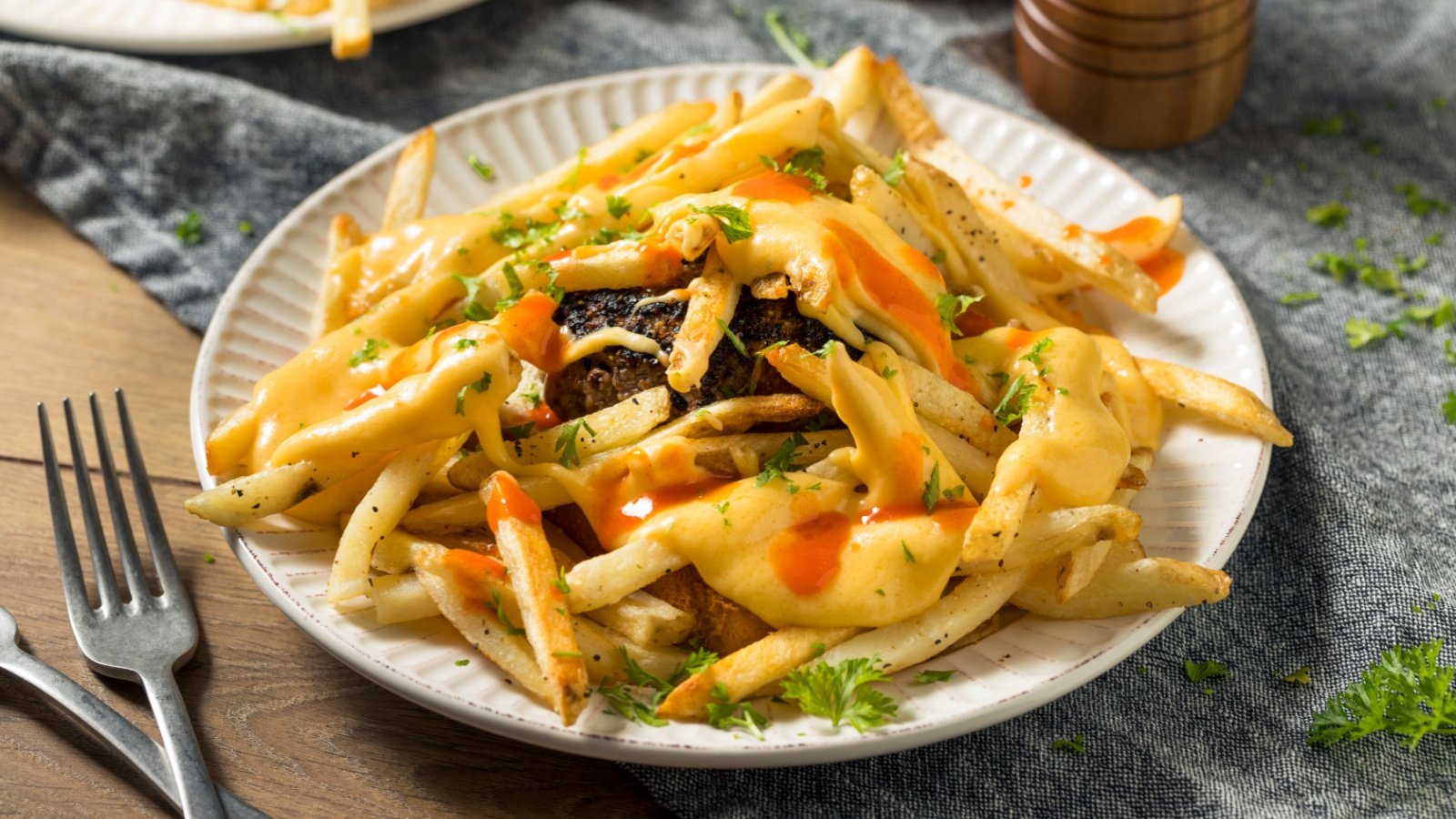 Beef Horseshoe Sandwich with Toast Fries and Cheese Sauce Brent Hofacker Shutterstock