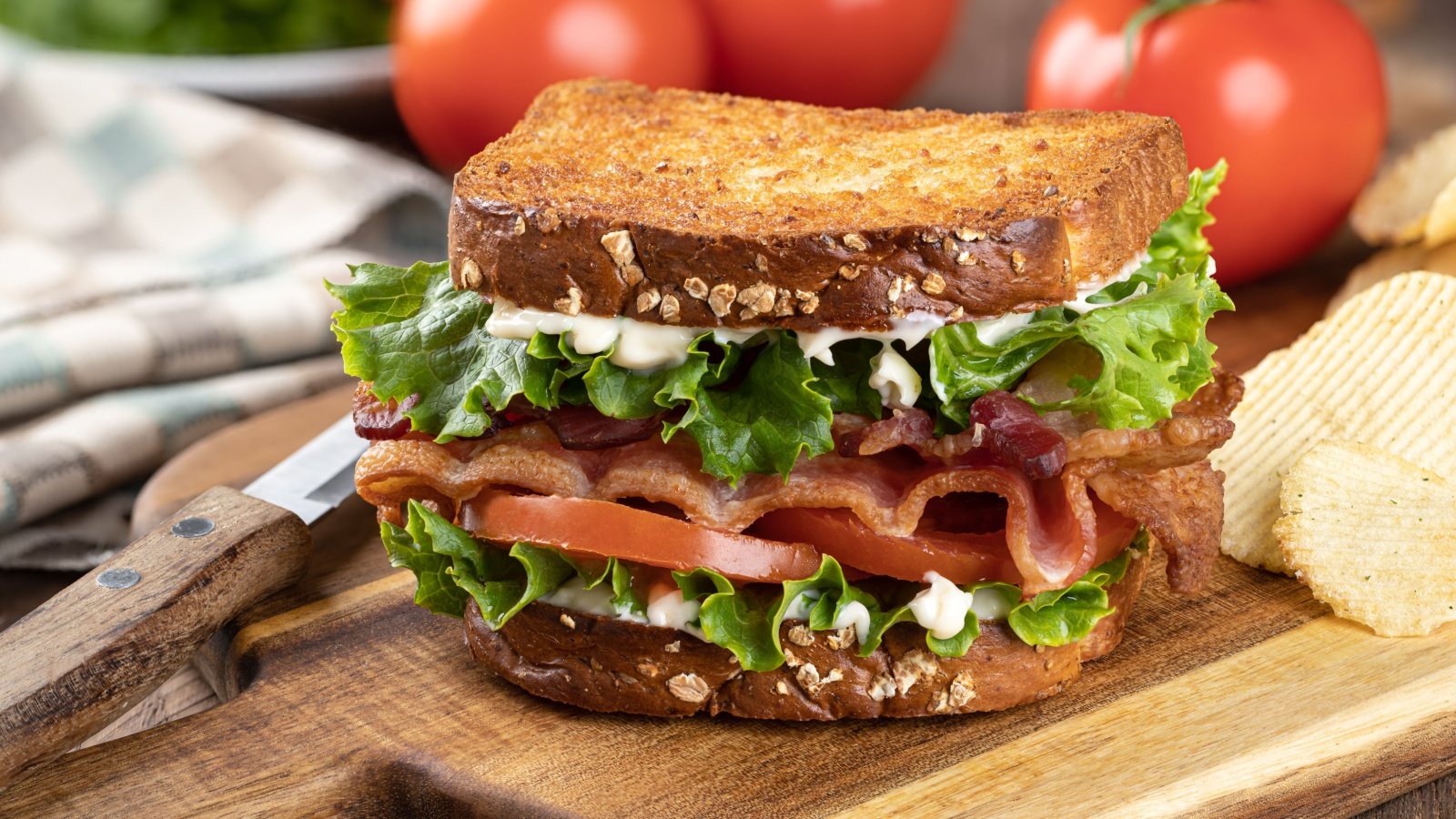 Blt sandwich made with bacon lettuce and tomato on toasted whole grain bread Charles Brutlag Shutterstock