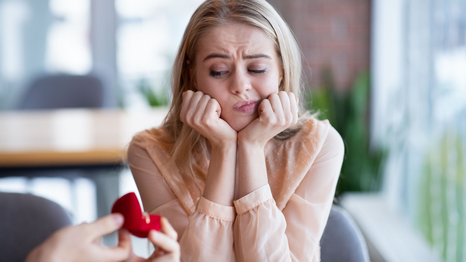 Bored millennial lady not willing to accept engagement ring proposal unsure prostock studio shutterstock