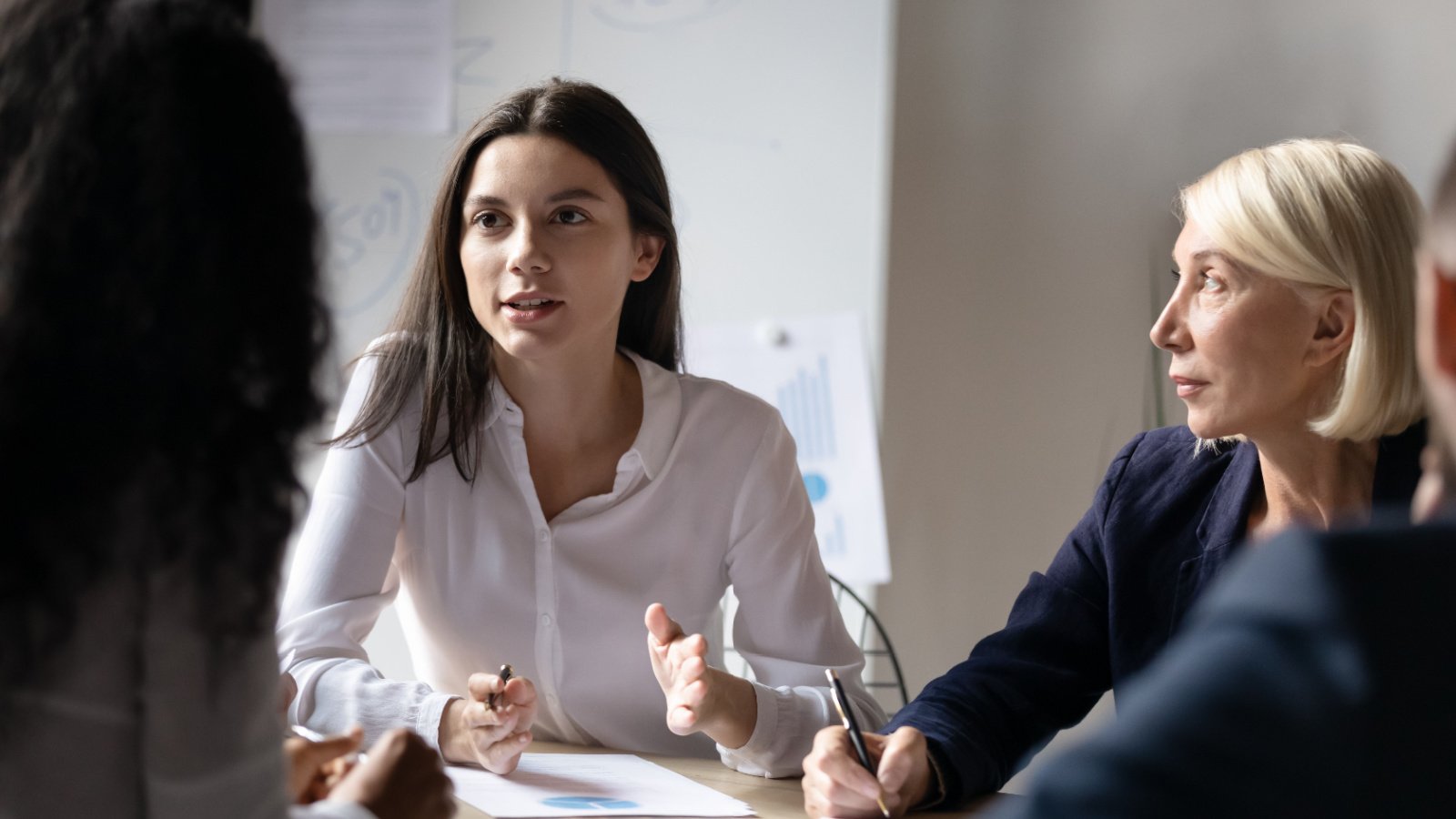 Business woman confident pitch meeting finance investor fizkes Shutterstock