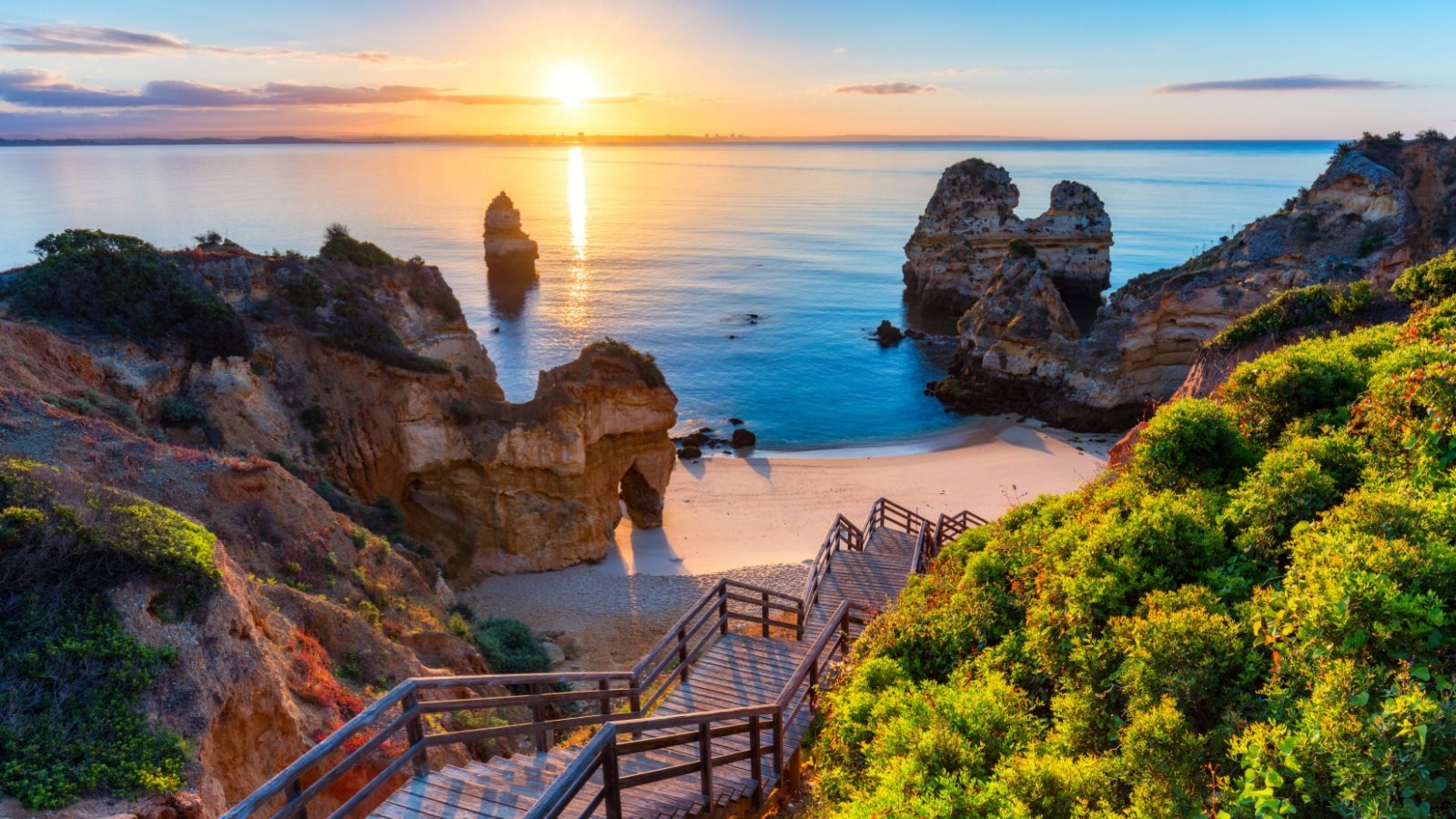 Camilo Beach (Praia do Camilo) at Algarve, Portugal DaLiu Shutterstock