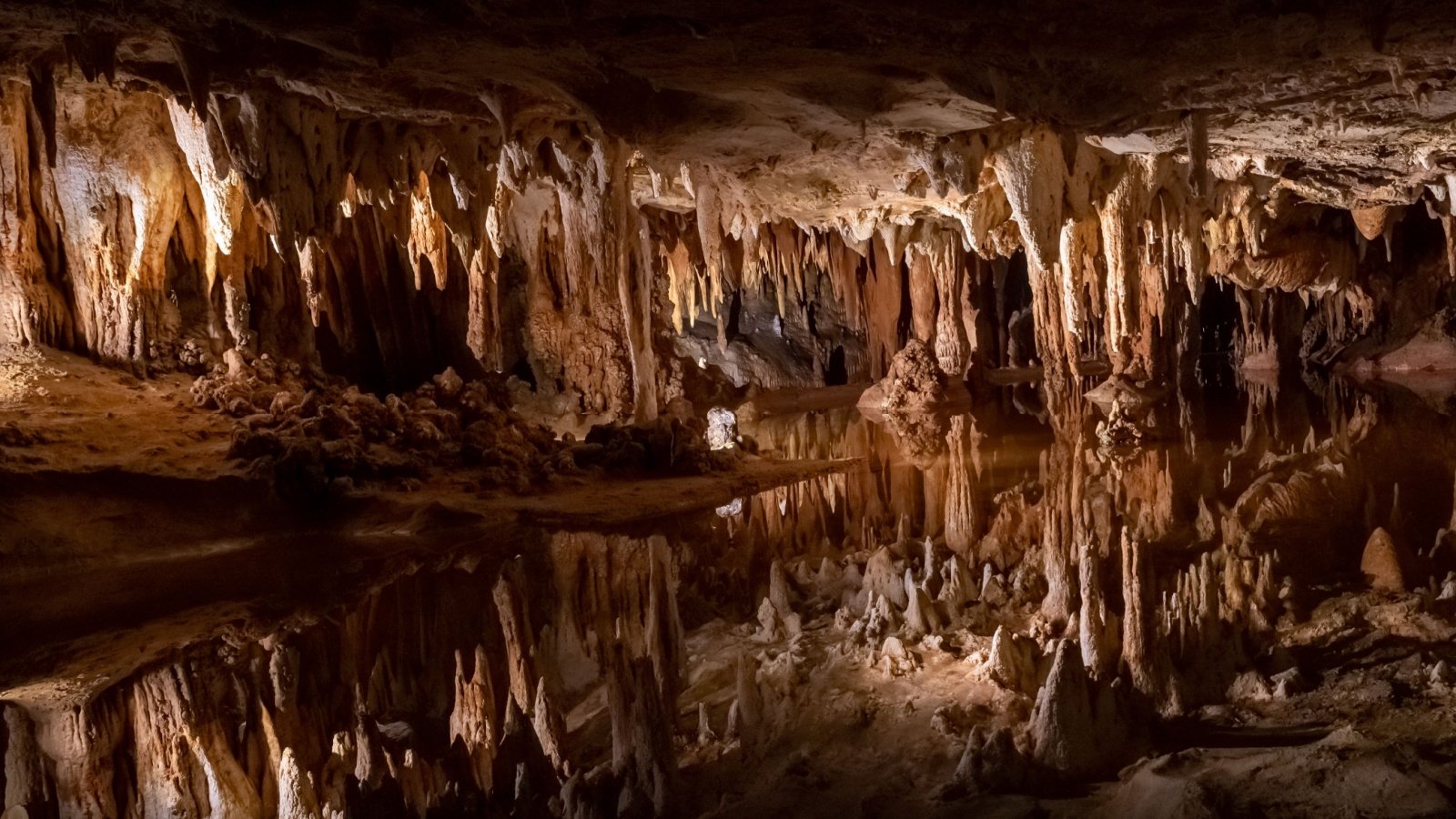 Cave underground cavern Stalactites and Stalagmites nature Belikova Oksana Shutterstock