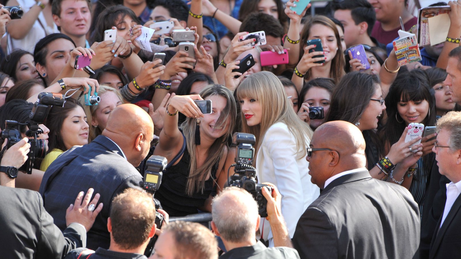 Celebrity Taylor Swift photos w fans Featureflash Photo Agency Shutterstock