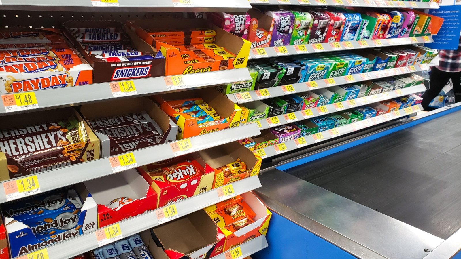 Checkout lane candy store pay gum walmart The Image Party Shutterstock