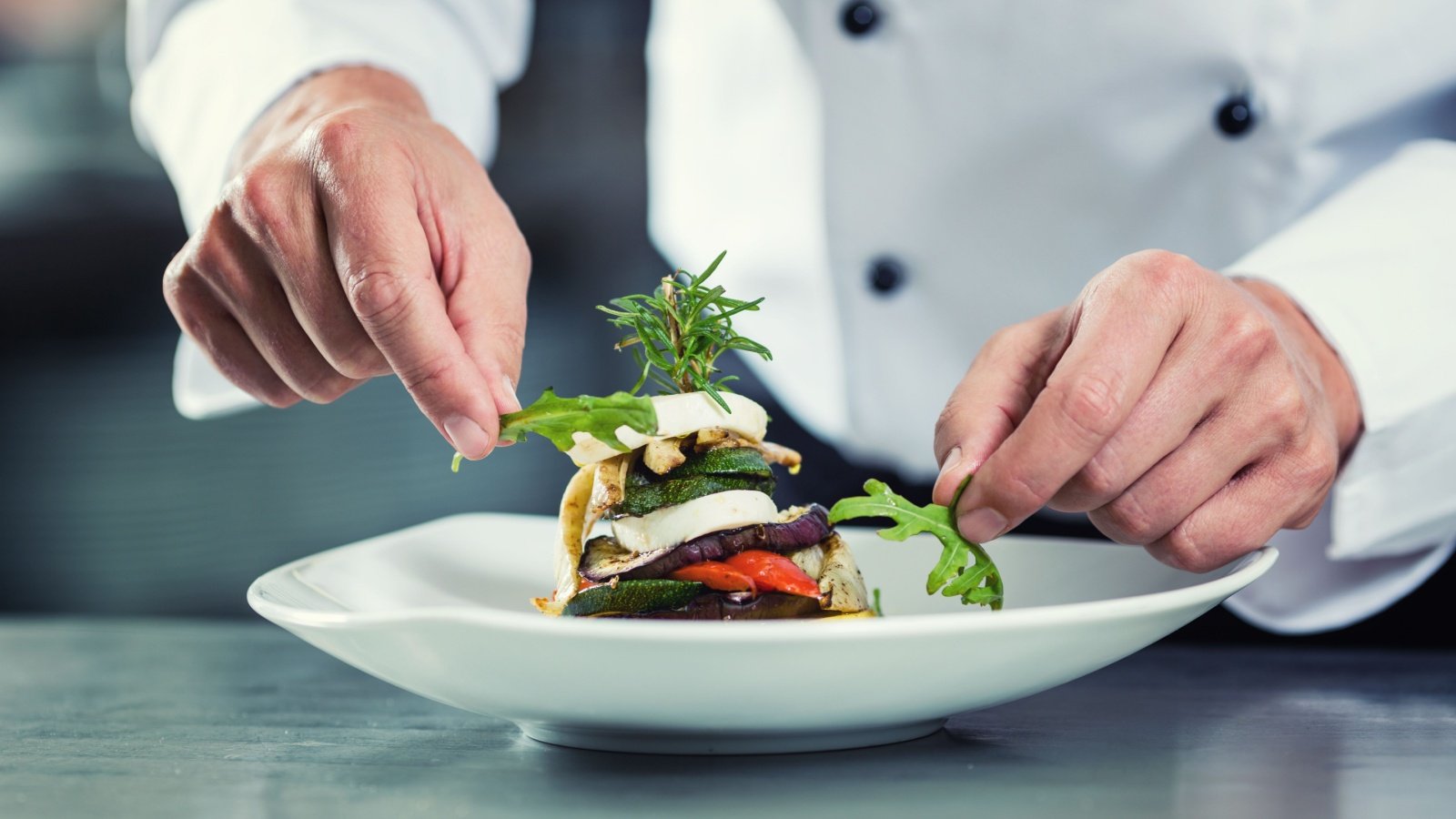 Chef restaurant garnish plating vegetable dish vegetarian Kzenon Shutterstock