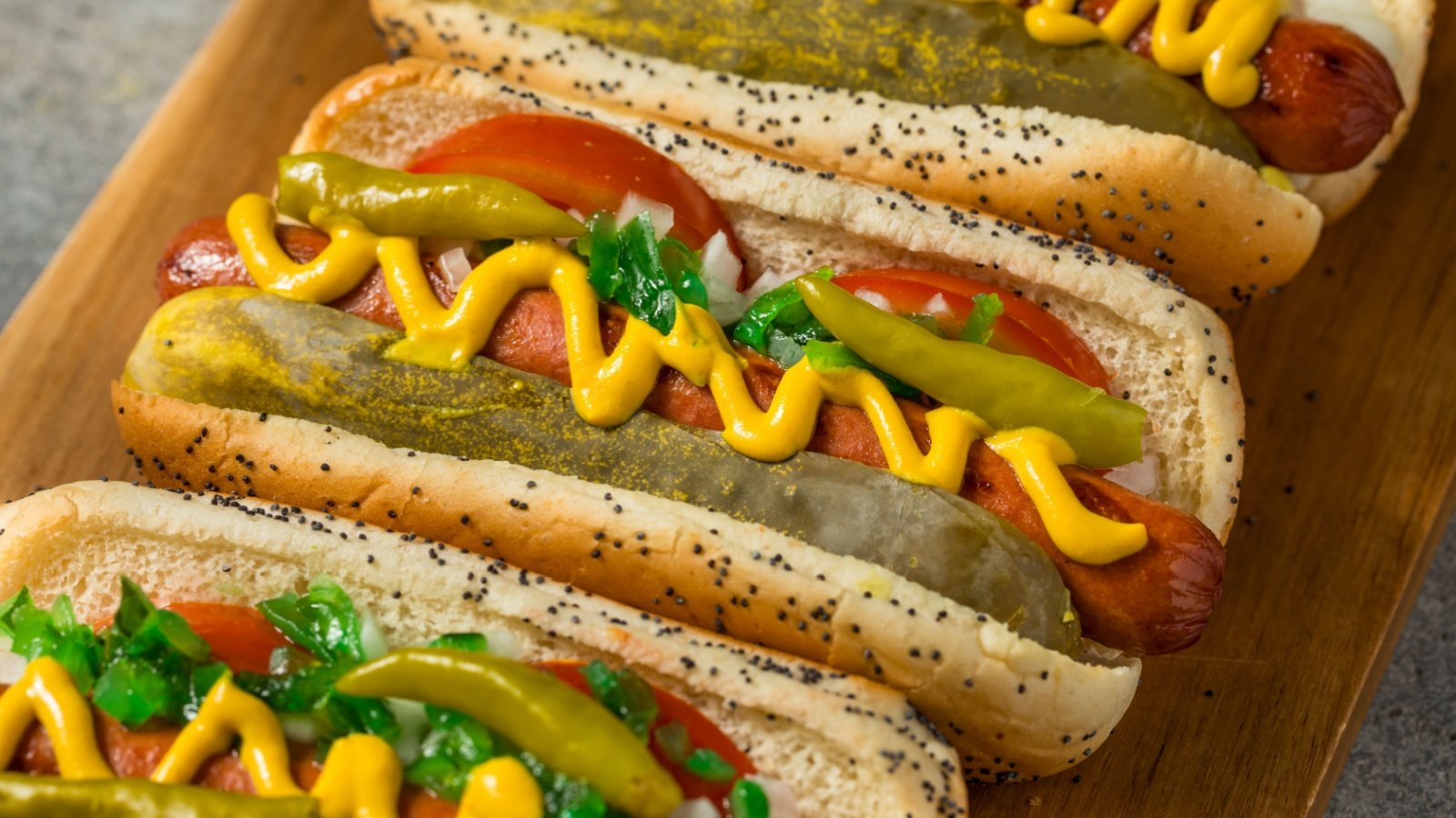 Chicago Style Hot Dogs with Mustard Relish tomato pickle and Sport Peppers Brent Hofacker Shutterstock