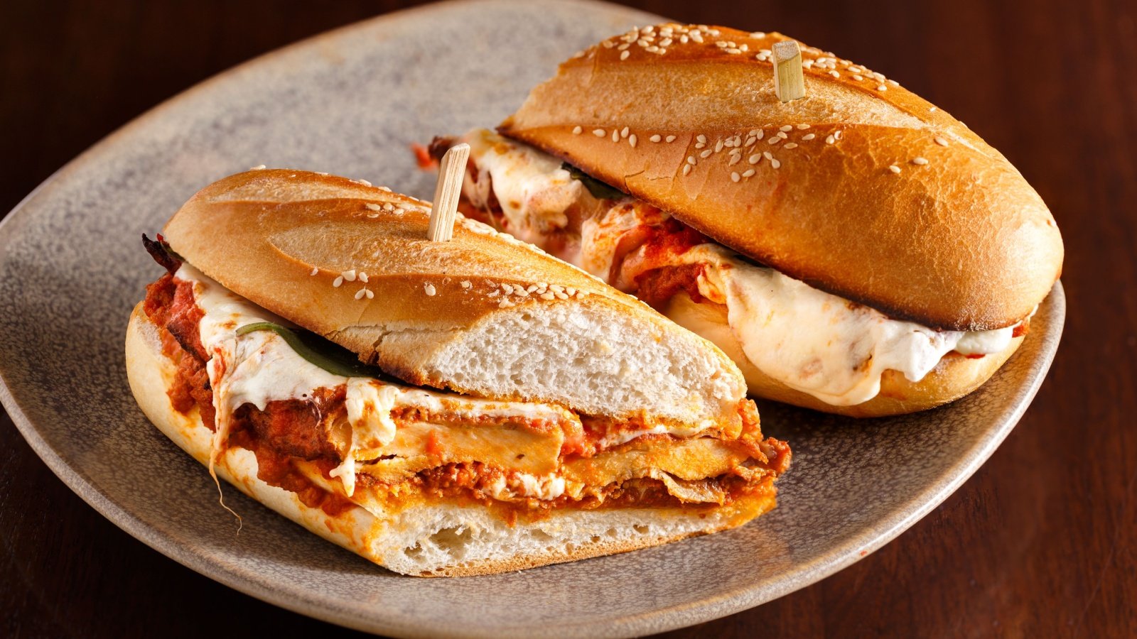 fried fast food fries onion rings chicken fingers Chicken Parmesan Sandwich Linda Hughes Photography Shutterstock
