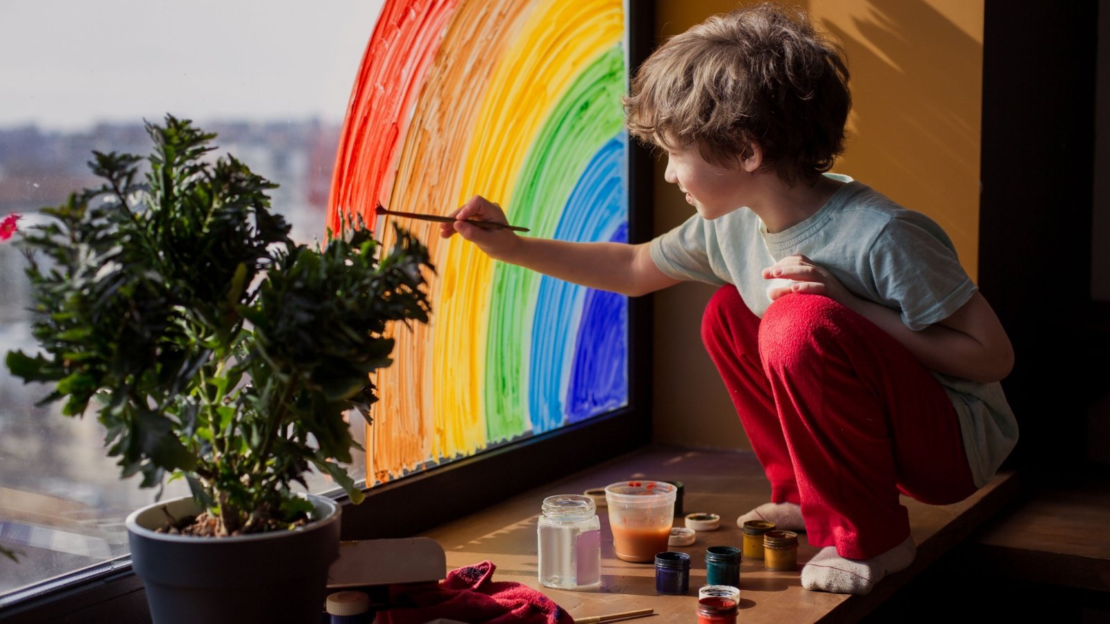 Child art window painting boy Da Antipina Shutterstock