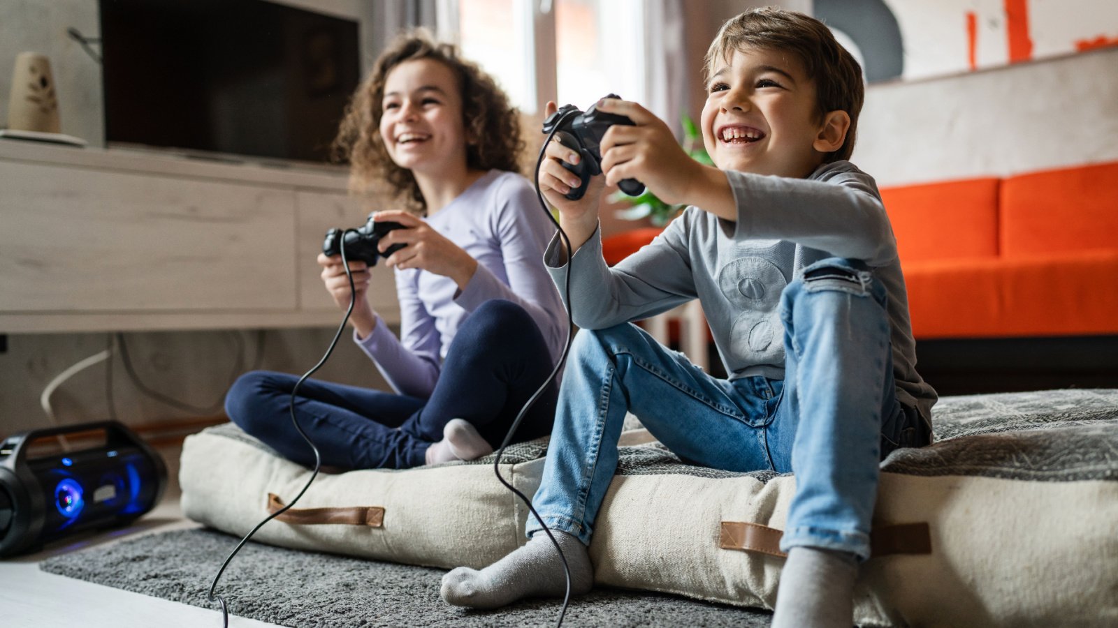 Child kids playing video games Miljan Zivkovic Shutterstock