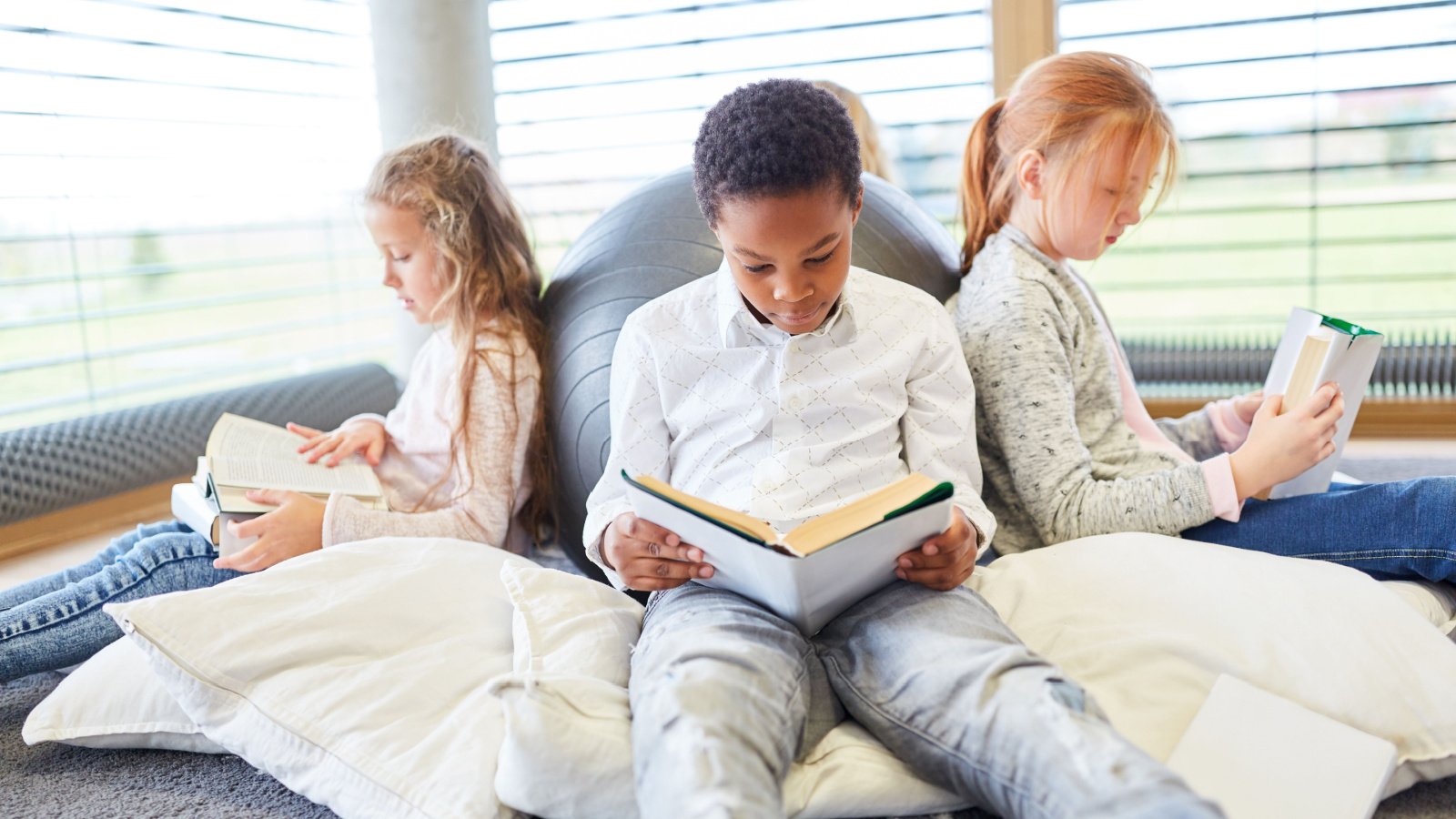 Children Read Books School Education Robert Kneschke Shutterstock