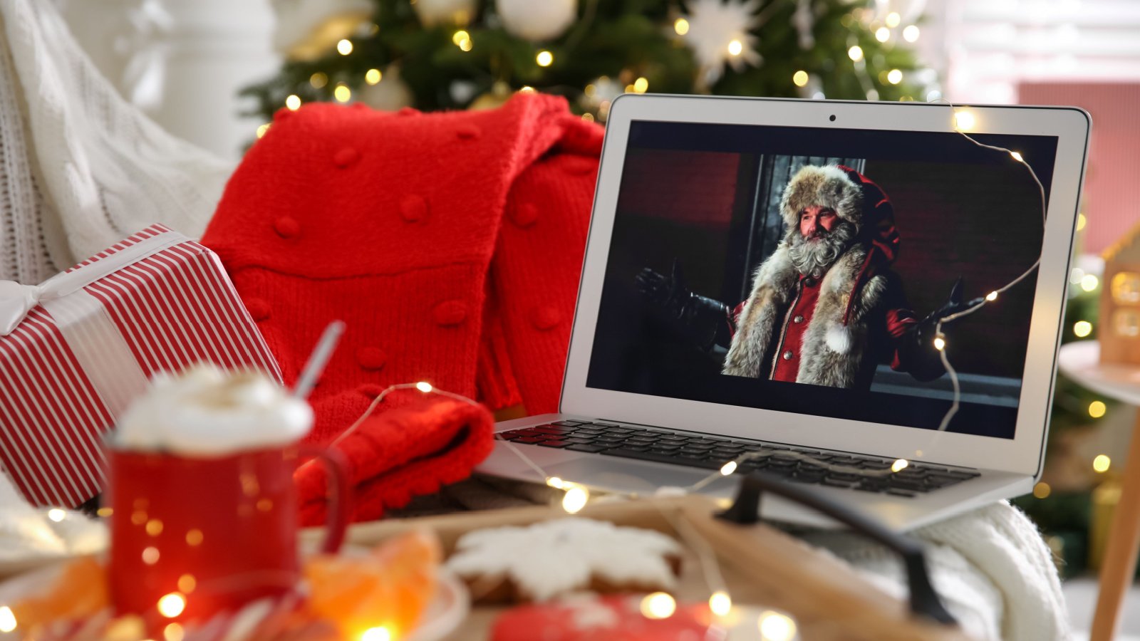 Christmas Chronicles on computer holiday movie cozy New Africa Shutterstock