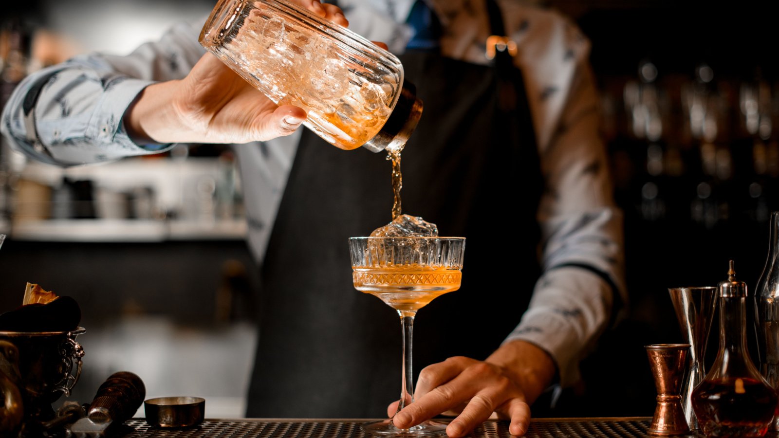 Cocktail Drinks orange whiskey bartender Maksym Fesenko Shutterstock