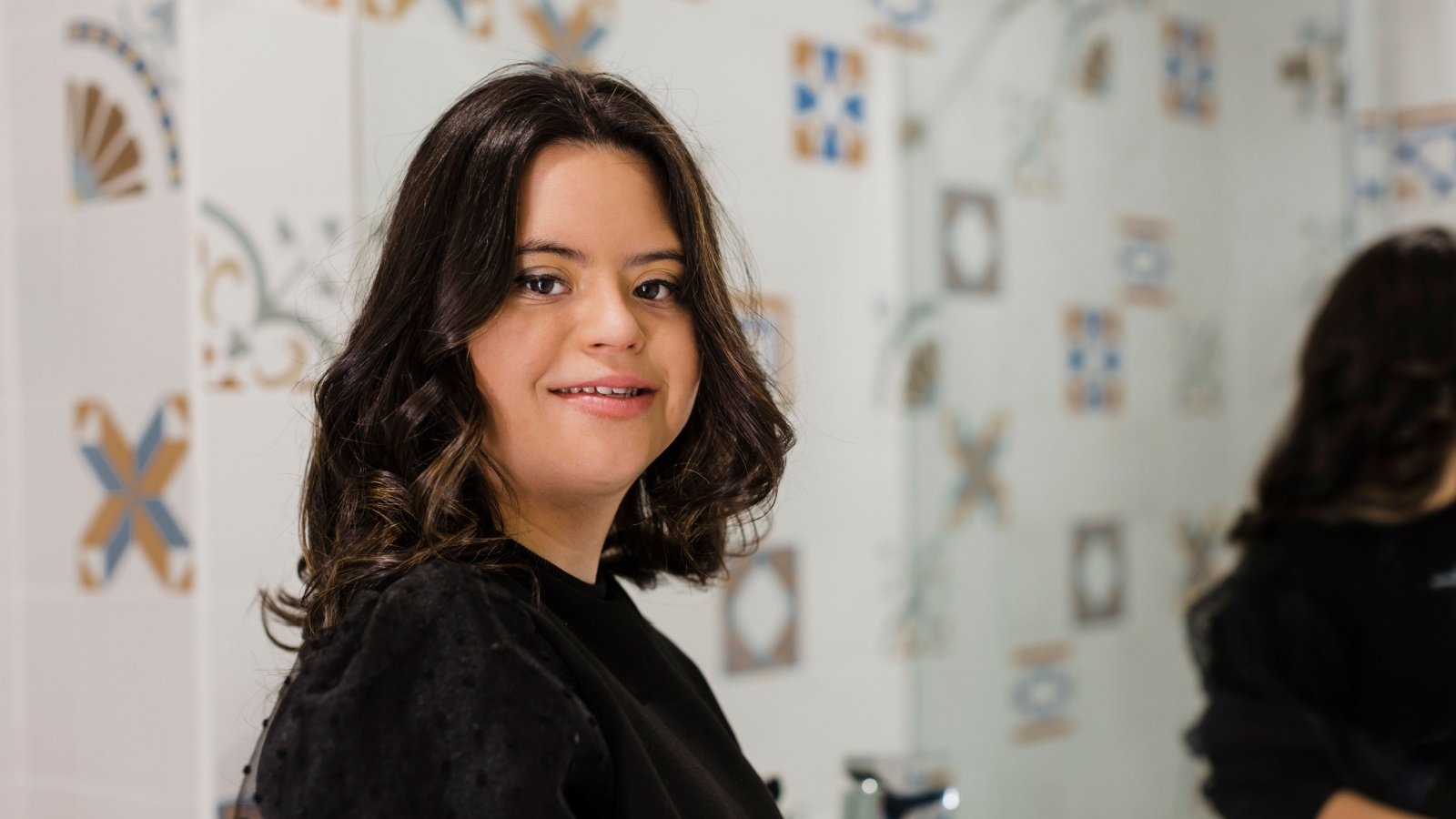 Confident young woman with down syndrome TunedIn by Westend61 Shutterstock