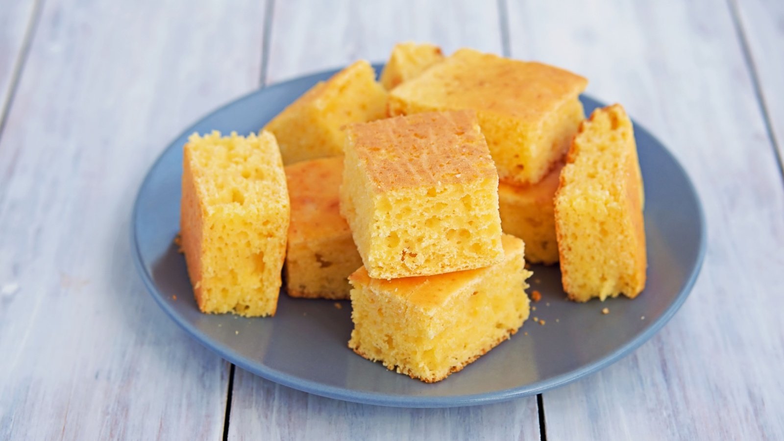 Cornbread on a plate corn cake southern cooking Happy food photo Shutterstock