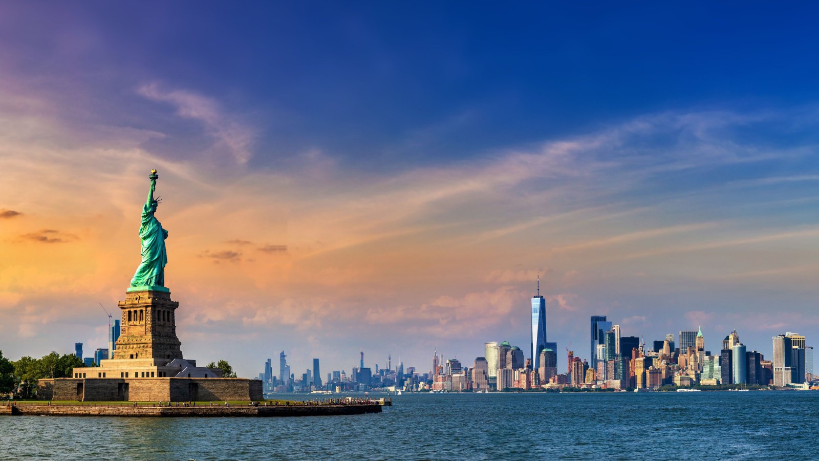 Country Travel Vacation USA Statue of Liberty New York skyline Sergii Figurnyi Shutterstock