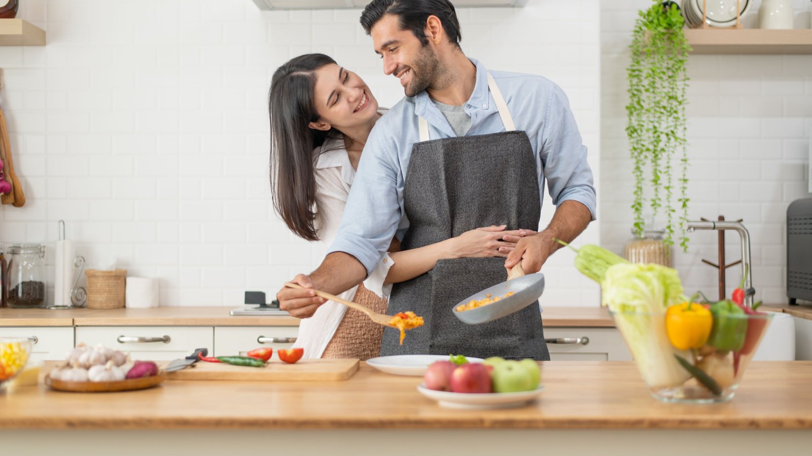 Couple Cooking Happy Healthy Romance surachet khamsuk shutterstock