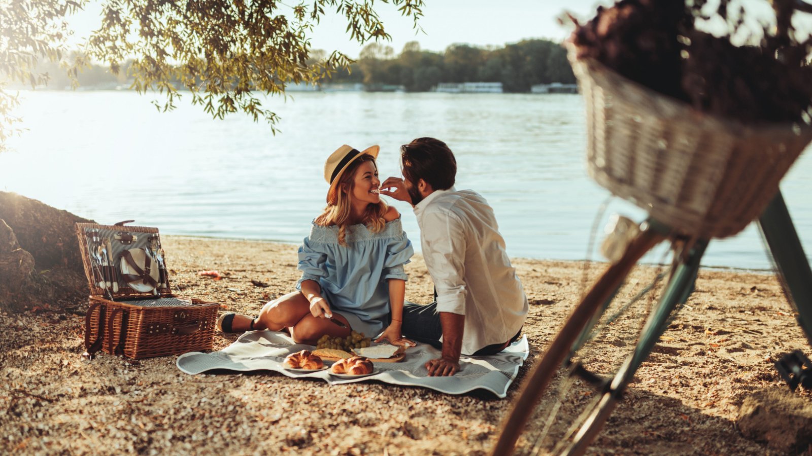 Couple Picnic Lake Date Bicycle bbernard shutterstock