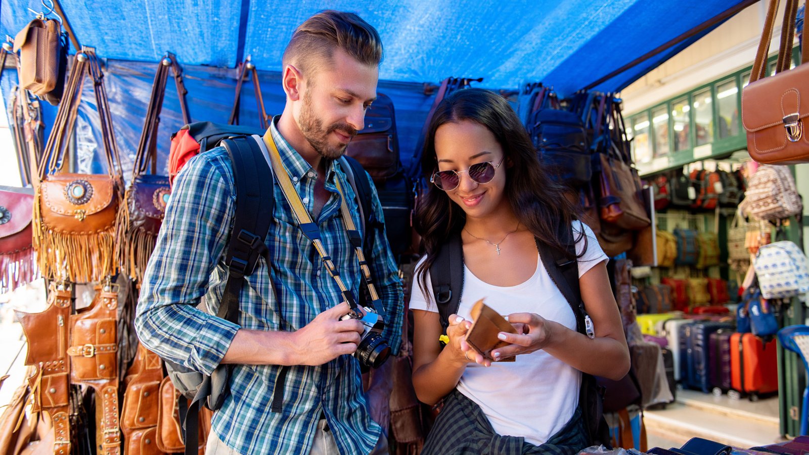 Couple tourists travel market Atstock Productions Shutterstock