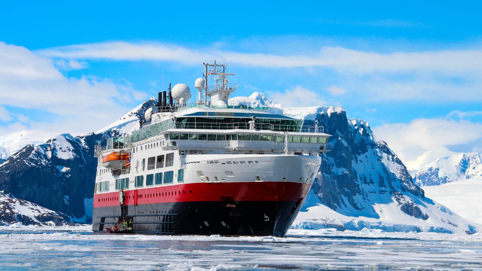 Cruise ship with tourists in Antarctica evenfh shutterstock