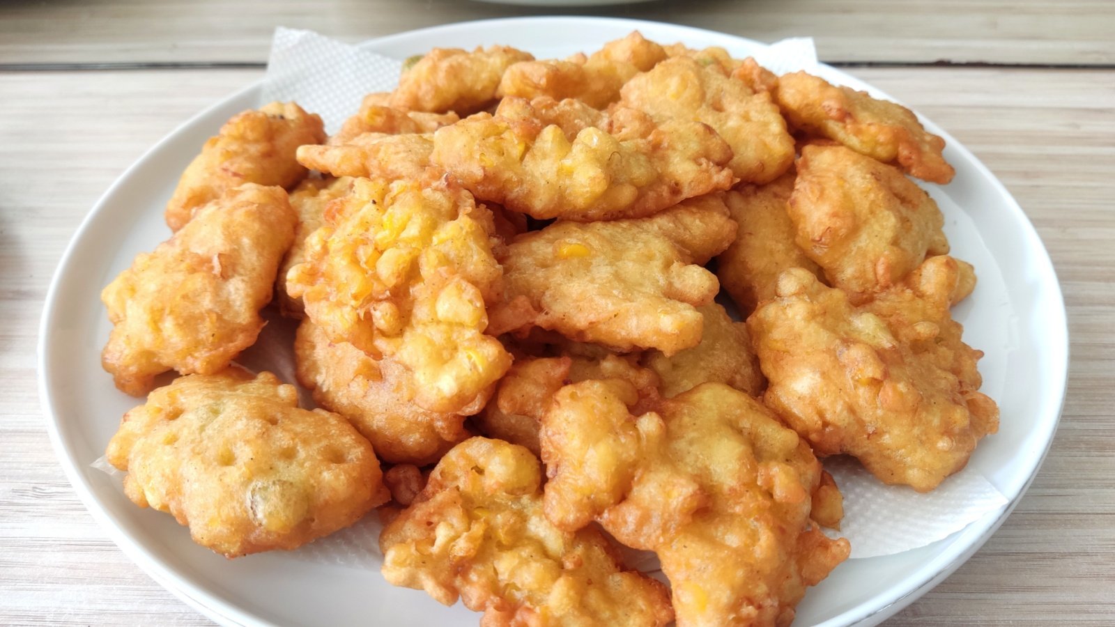 Deep fried Corn Fritters Bakwan Jagung apresthetics Shutterstock