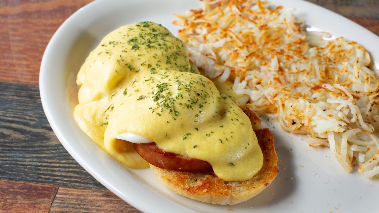 Eggs benedict breakfast with hashbrowns The Image Party Shutterstock