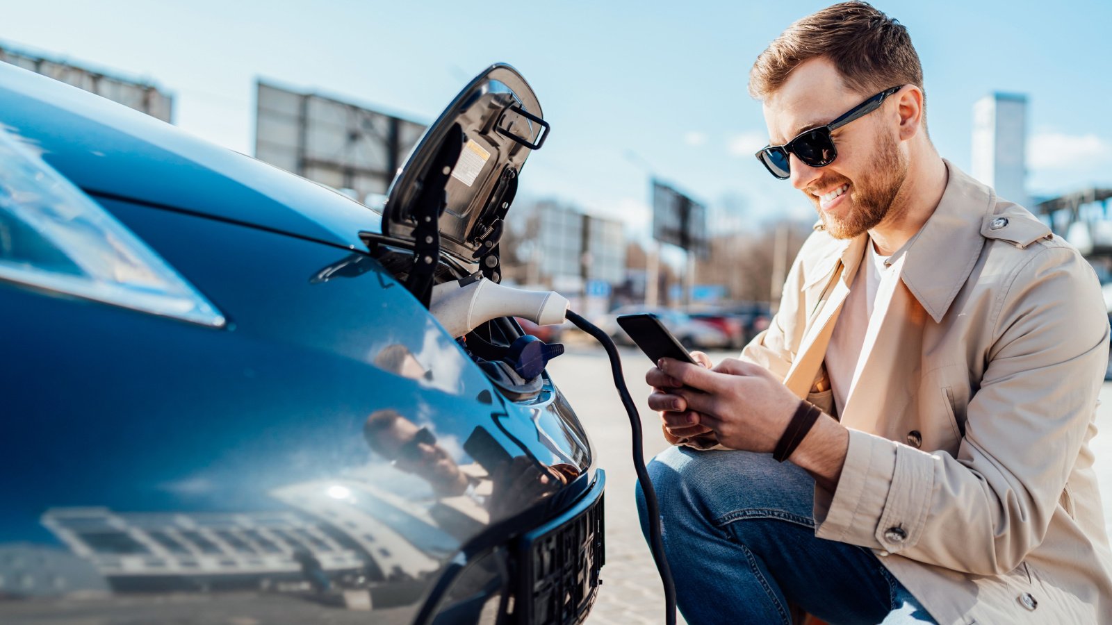 Electric vehicle charging car Andriiii Shutterstock