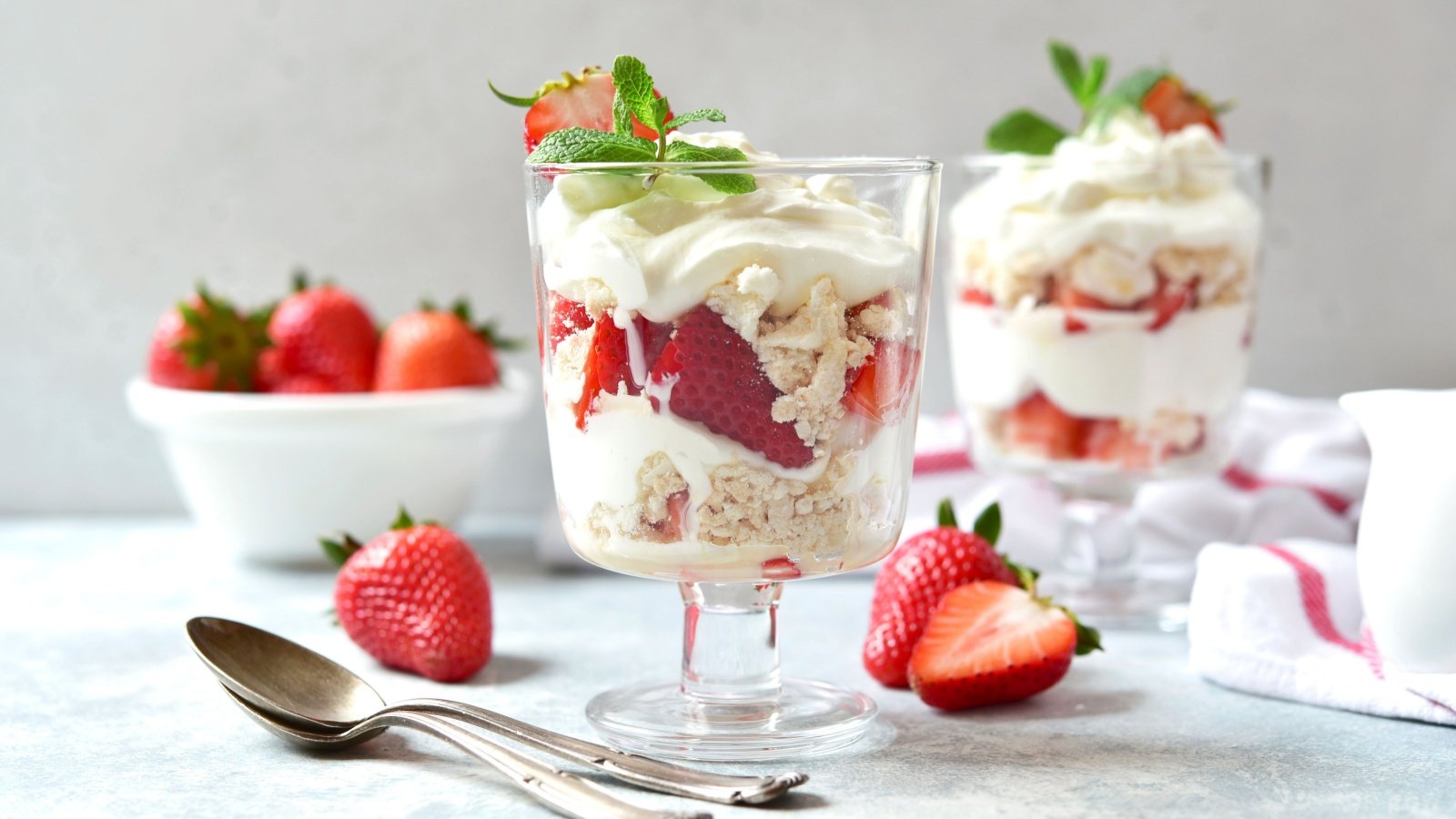 Eton mess dessert with meringue whipped cream and fresh berries trifle parfait strawberry Liliya Kandrashevich Shutterstock