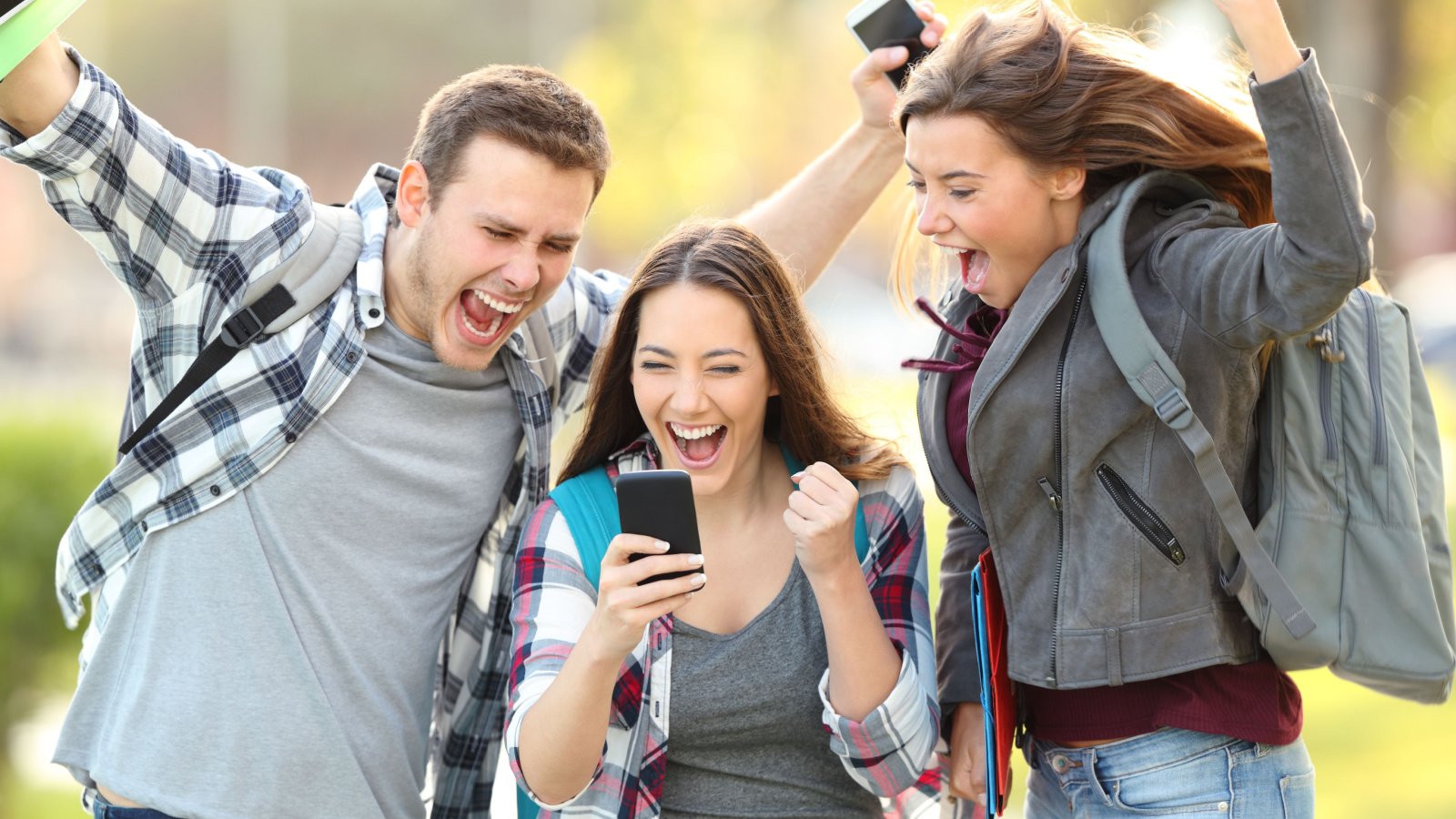 Excited teen students college admissions Antonio Guillem Shutterstock