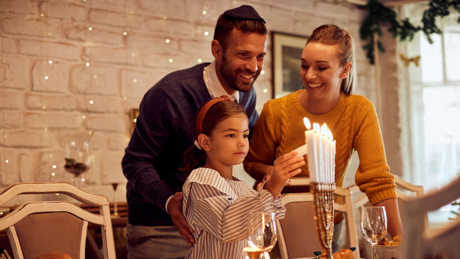 Family Parenting Holiday menorah Hanukkah Drazen Zigic Shutterstock