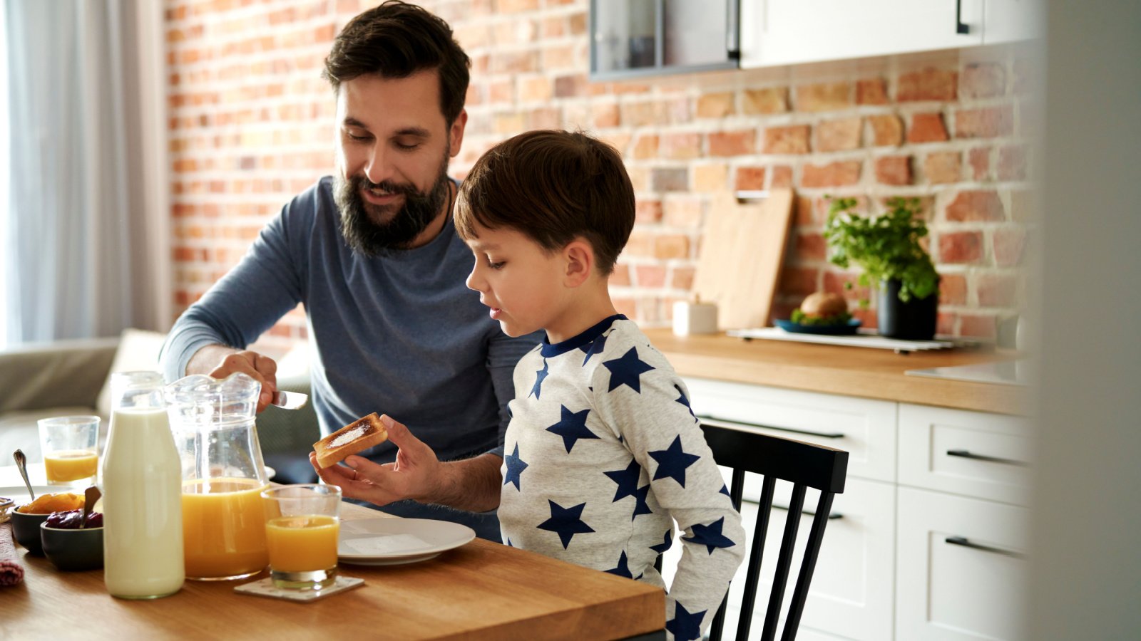 Father Son Butter Bread Breakfast gpointstudio shutterstock