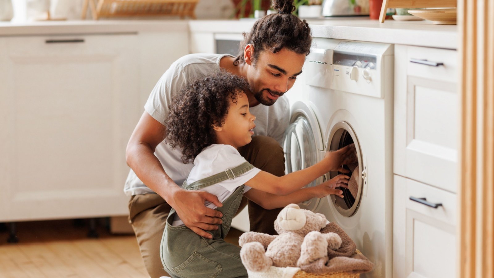 Father and son kid doing laundry Evgeny Atamanenko Shutterstock