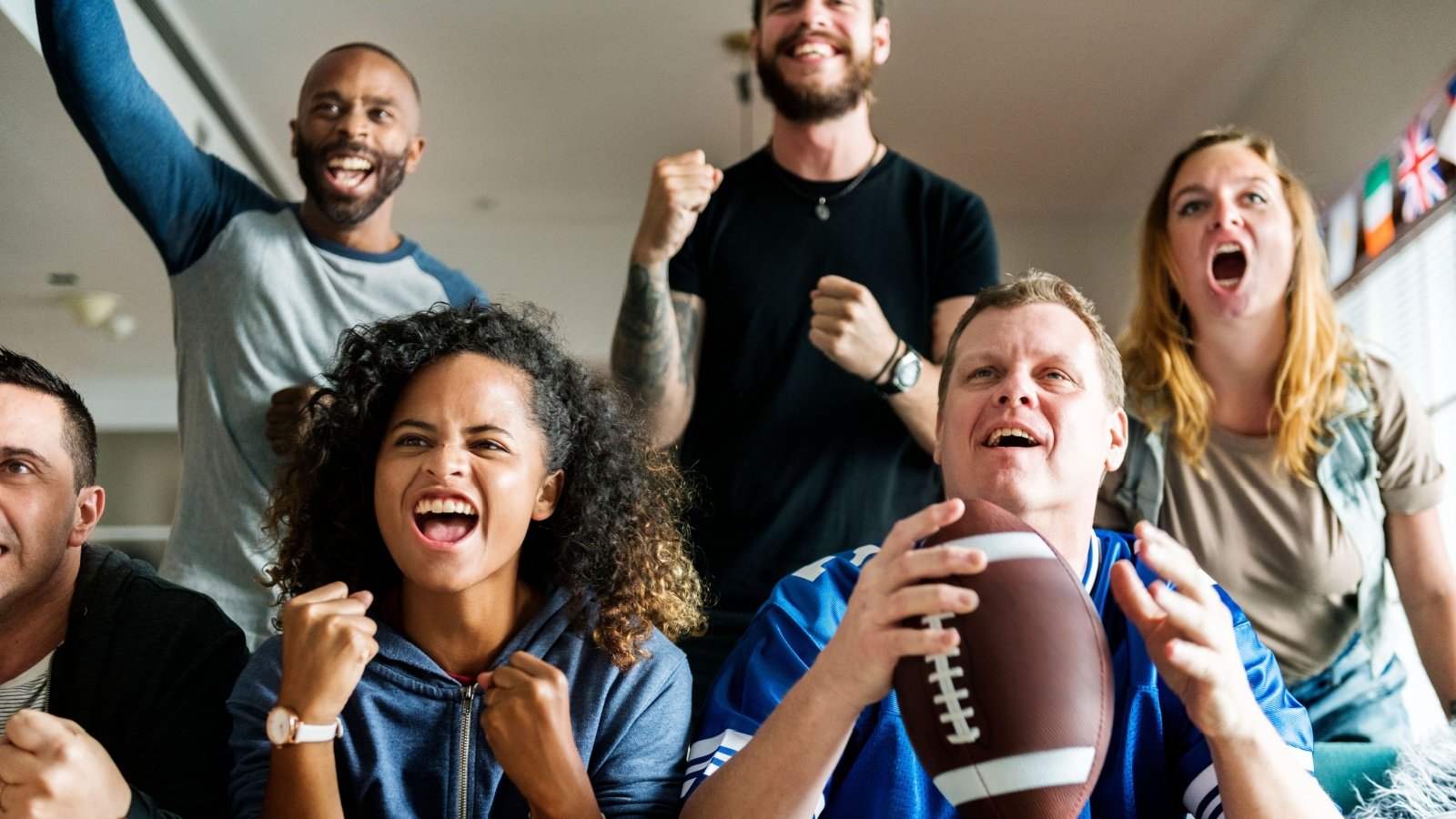 Football Fans Watch Sports Rawpixel.com Shutterstock