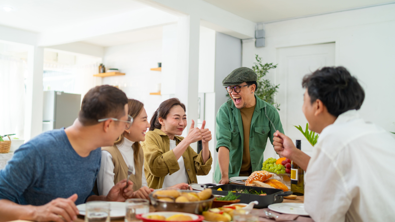 Friends Dinner Party Home Family Meal CandyRetriever Shutterstock