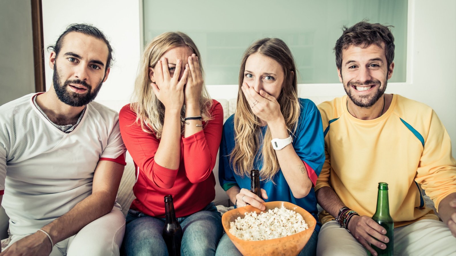 Friends Laugh Watch Play Popcorn Beer oneinchpunch Shutterstock