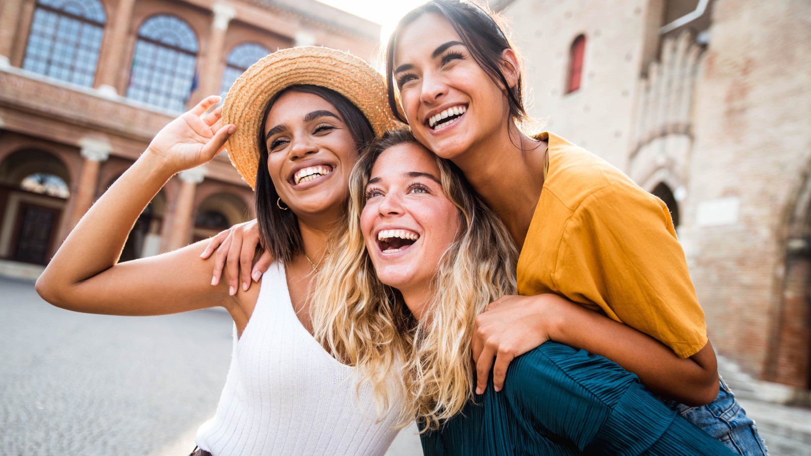 Friends POC Women Happy Travel DavideAngelini Shutterstock