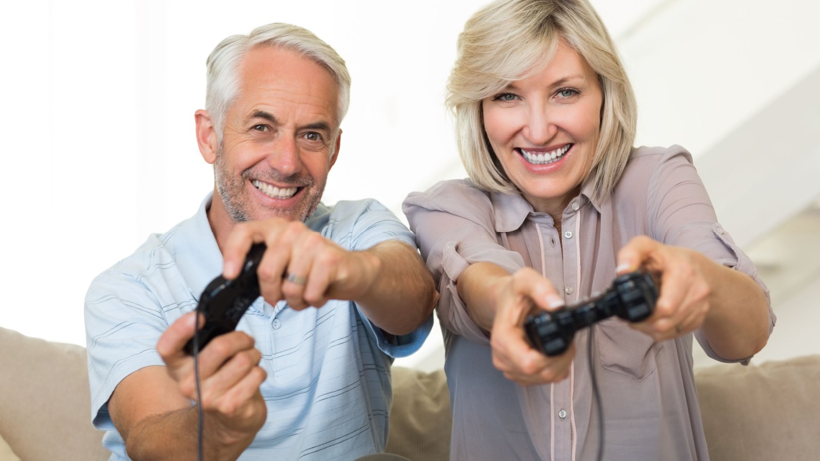 Gaming Video Game Hobby Fun Mature Couple Woman Male wavebreakmedia Shutterstock