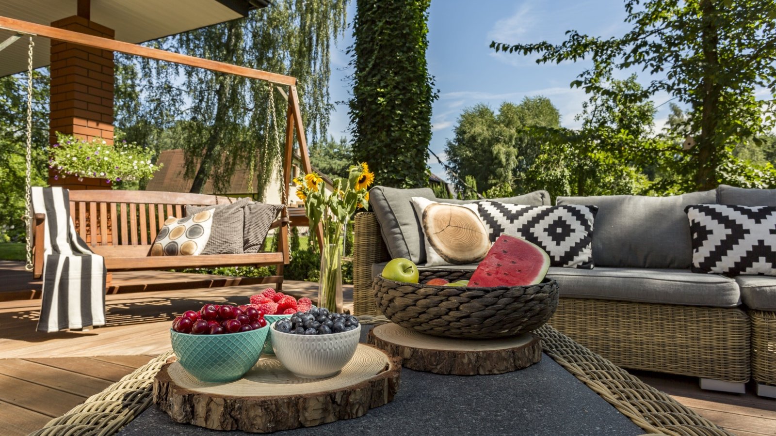 Garden swing and couch in backyard Ground Picture Shutterstock