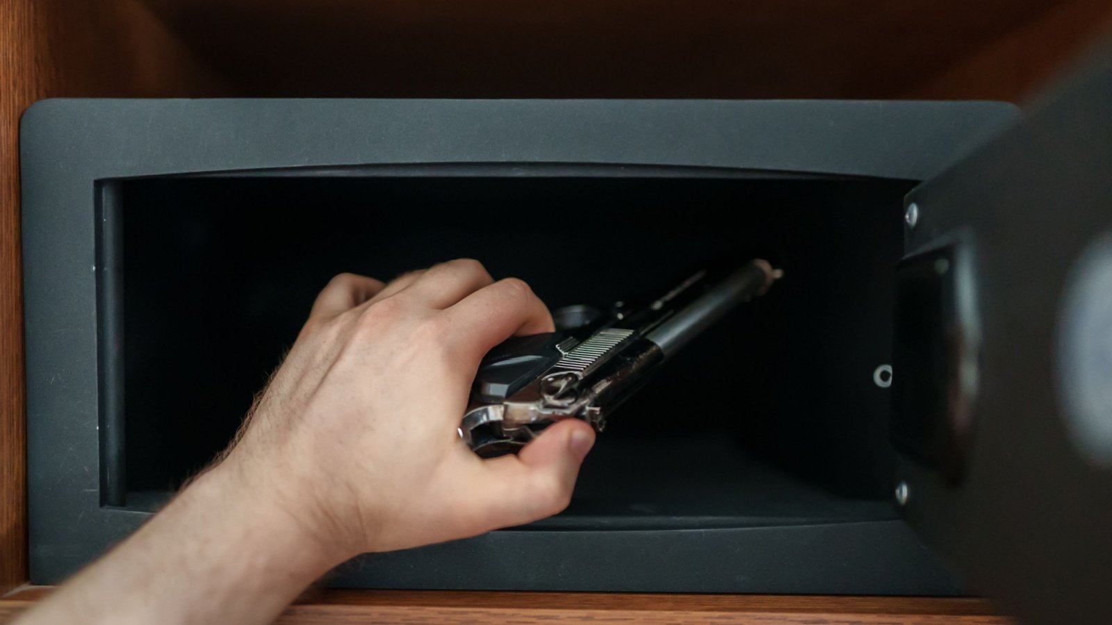 Gun safe firearm security lockbox weapon M Production Shutterstock