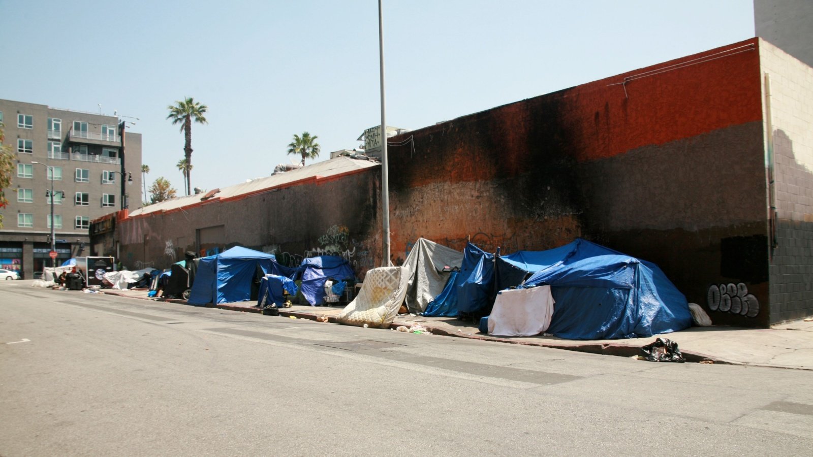 Homeless encampments tents poverty poor mikeledray Shutterstock